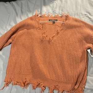 Derek Heart pink women’s v-neck sweater.